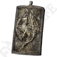 Dragoncrest Greatshield Talisman enormously reduces Physical Damage taken, by 20%
